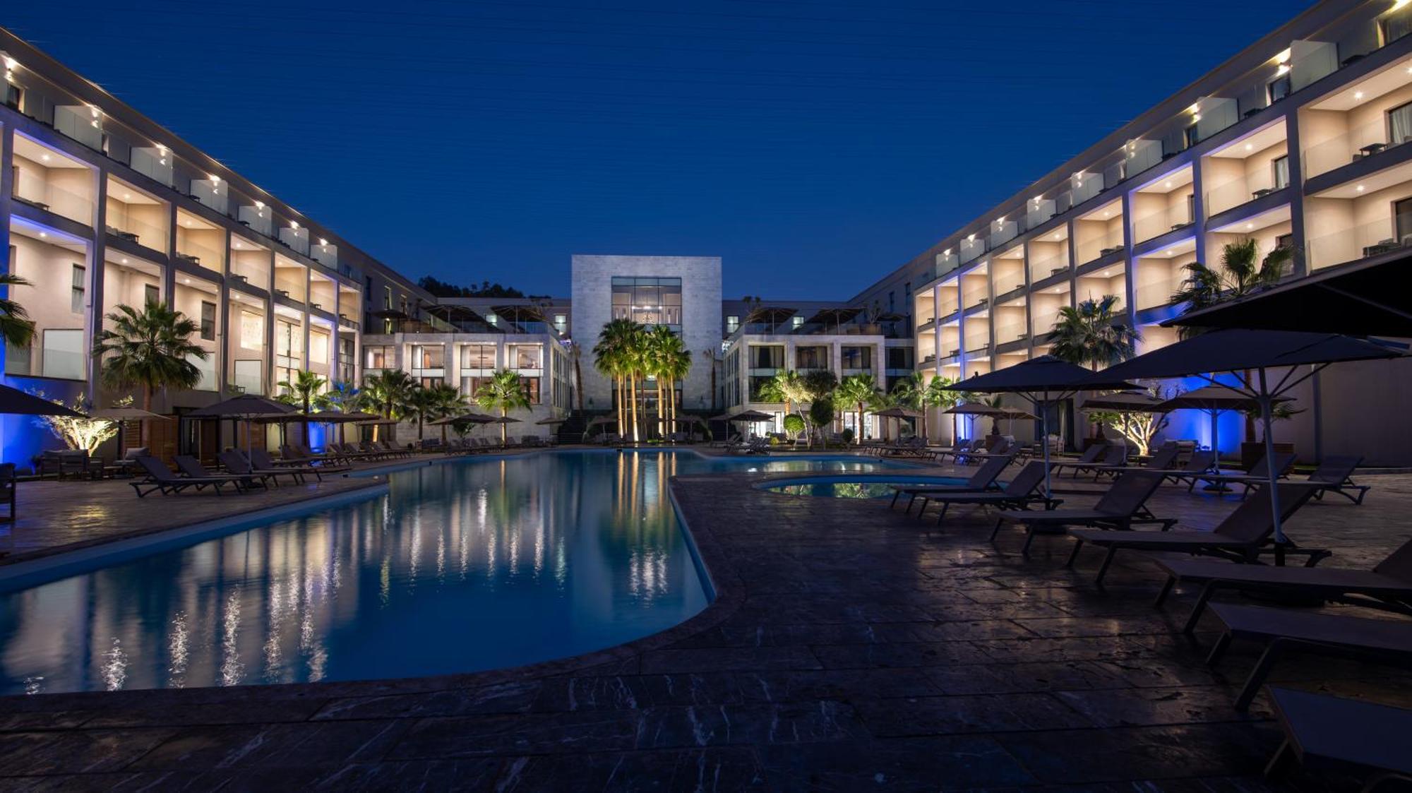 Dominium Palace Agadir Exterior photo The hotel at night